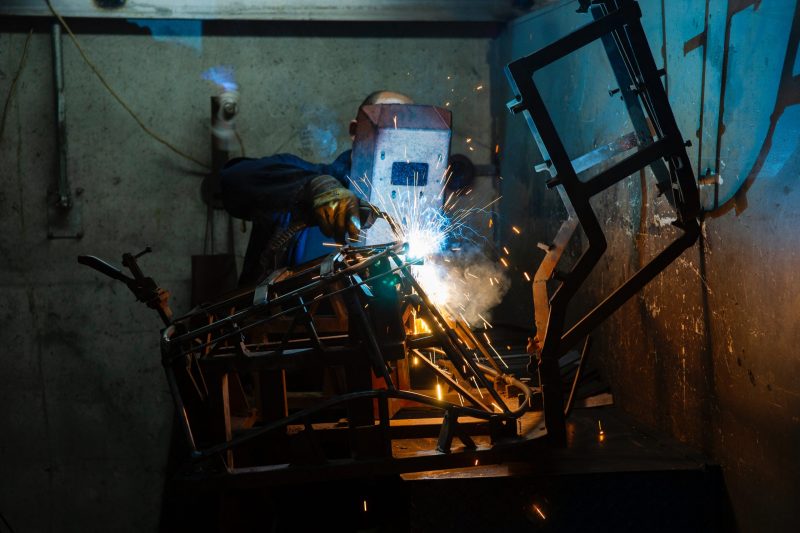 man using a laser cutter