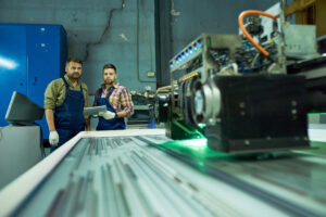 engineers using cnc machine at factory with the latest laser cutting technologies 